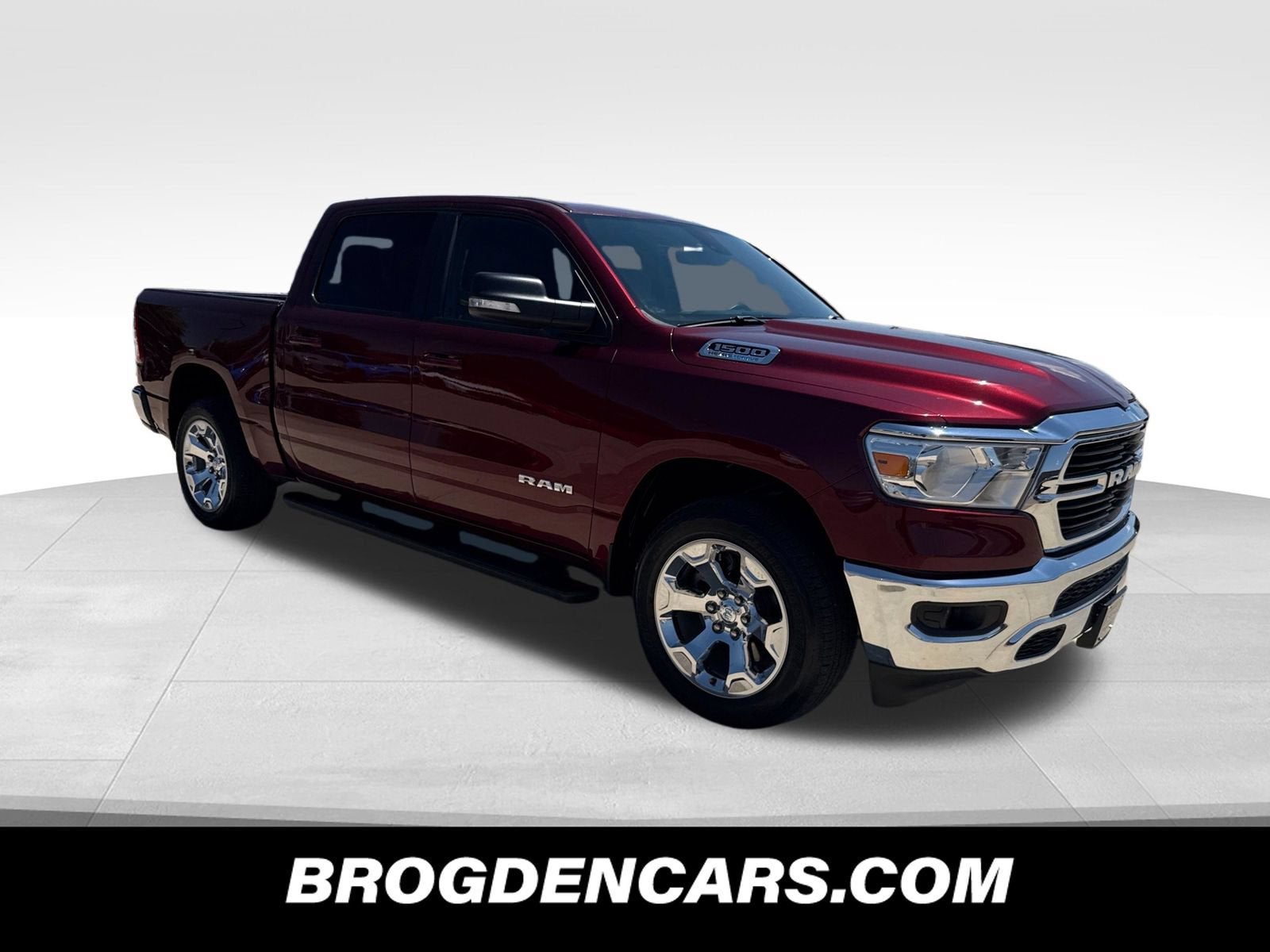 2021 RAM 1500 Big Horn in Delmonico Red Pea — front three-quarter view