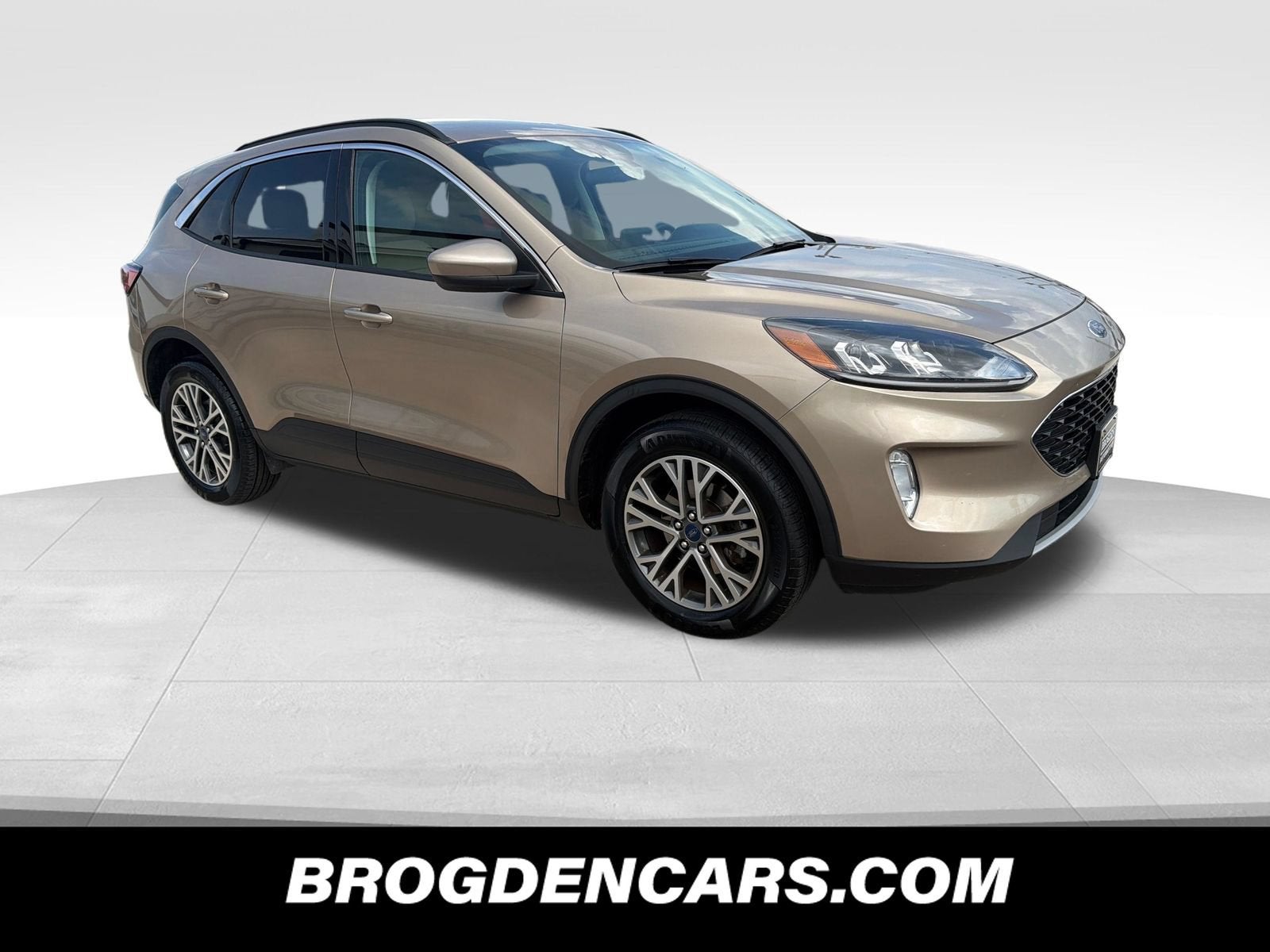 2021 Ford Escape SEL in Gold — front three-quarter view