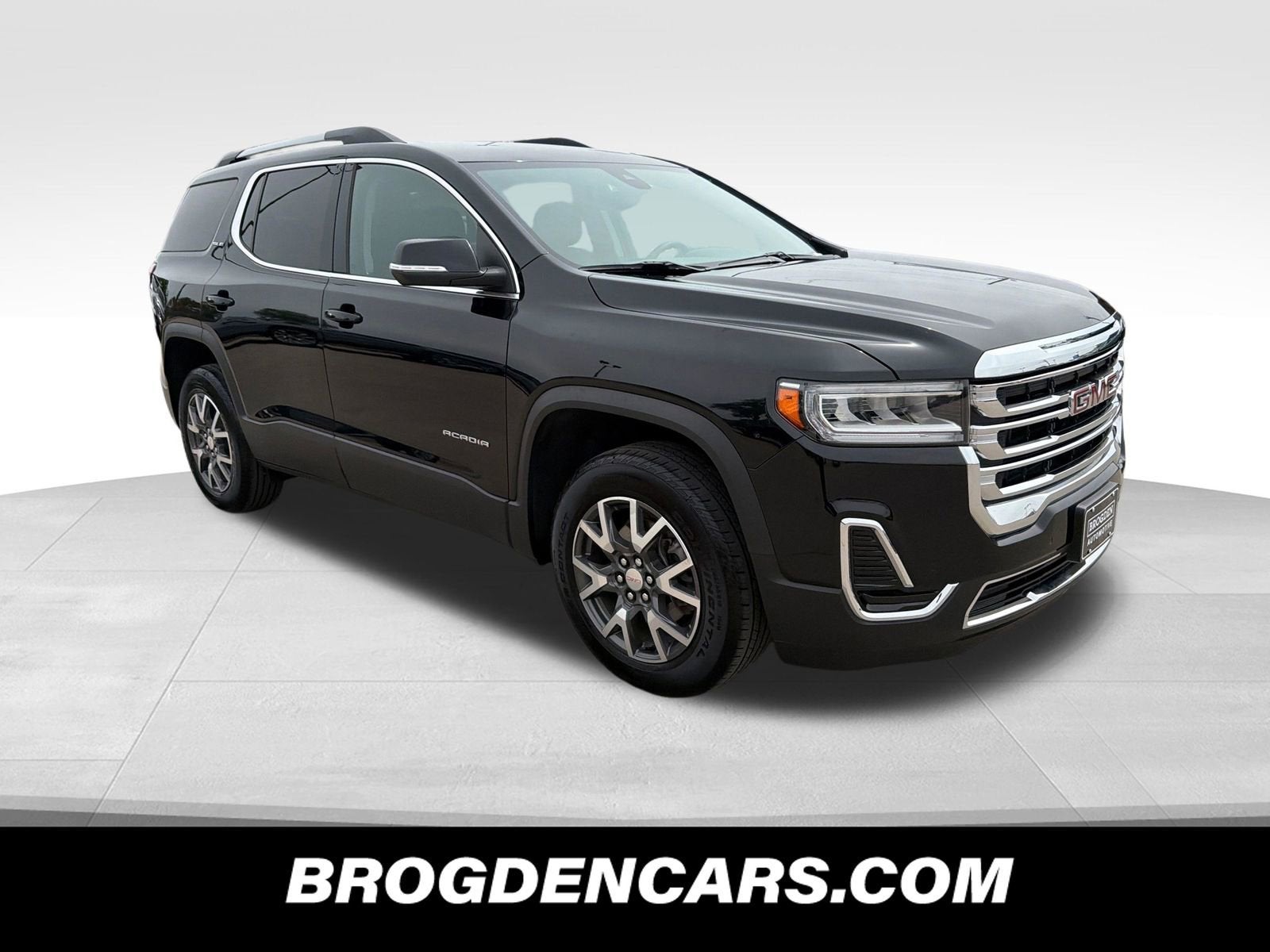 2023 GMC Acadia SLE in Ebony Twilight Metallic — front three-quarter view