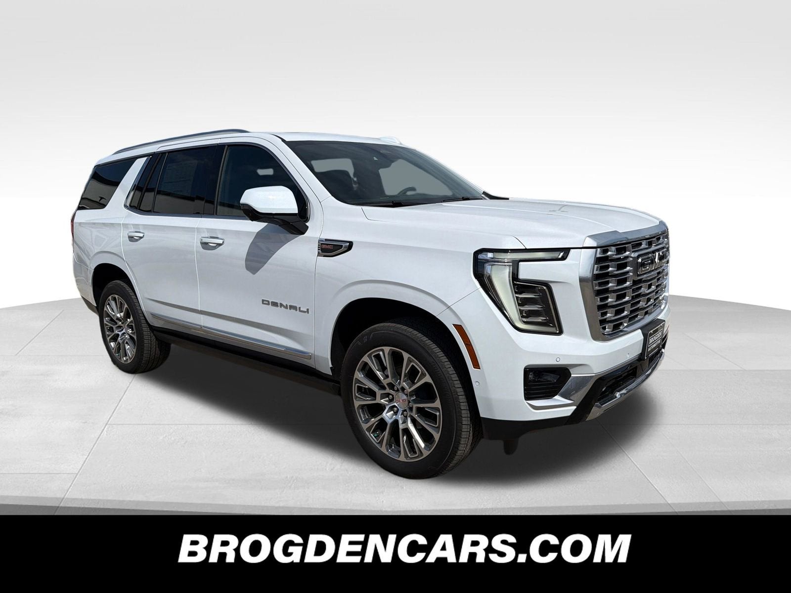 2026 GMC Yukon Denali in Glacier White Tricoat — front three-quarter view