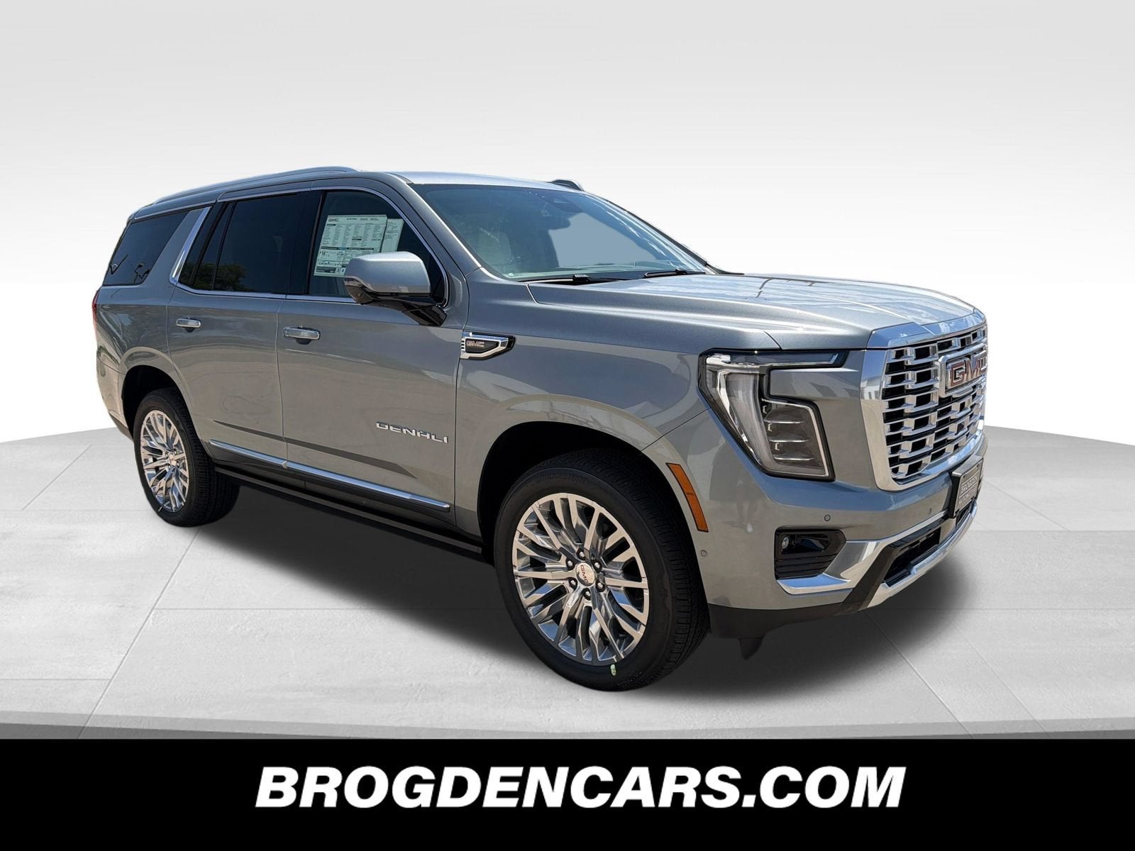 2026 GMC Yukon Denali in Sterling Metallic — front three-quarter view