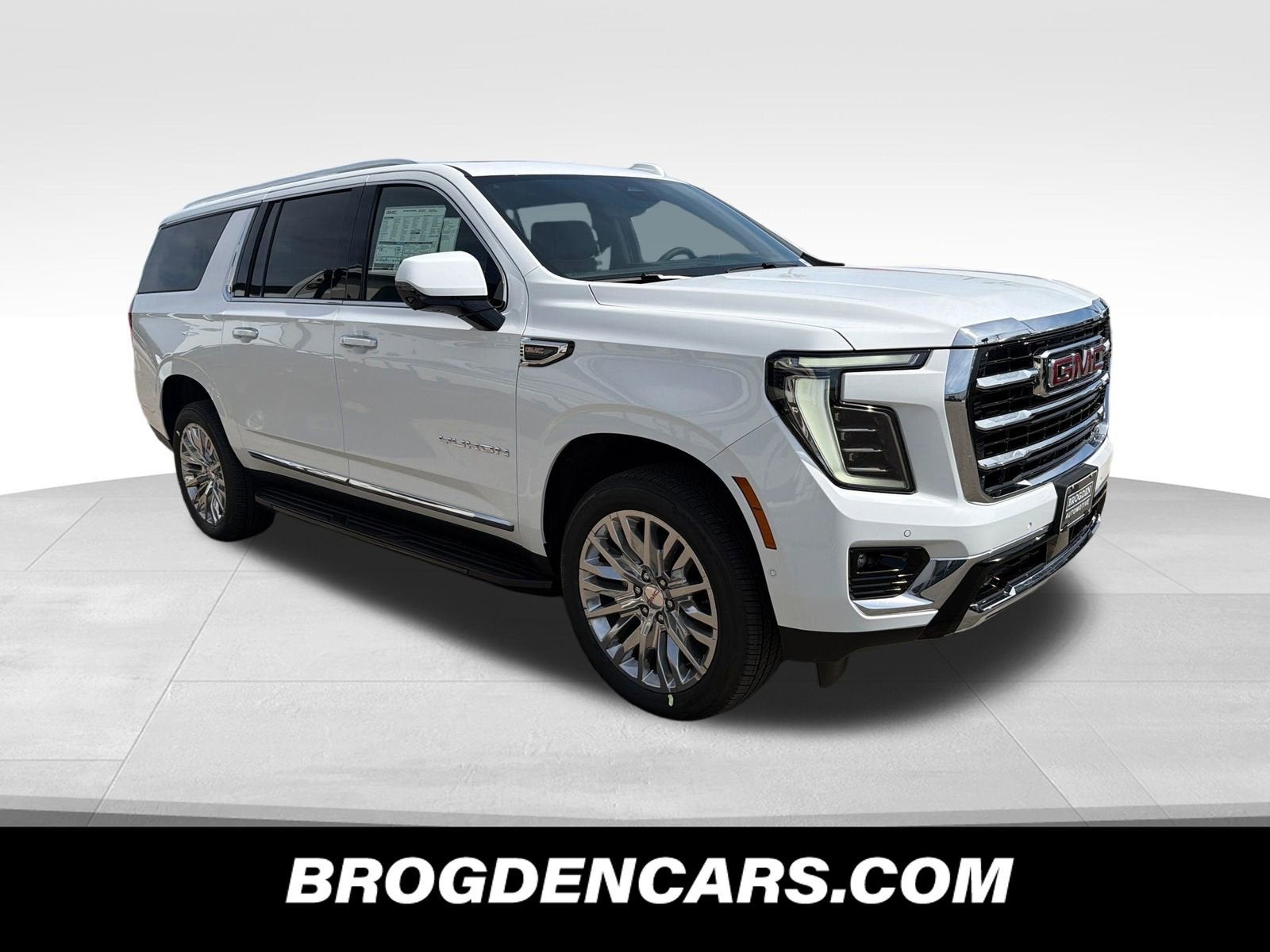 2026 GMC Yukon XL Elevation in Summit White — front three-quarter view