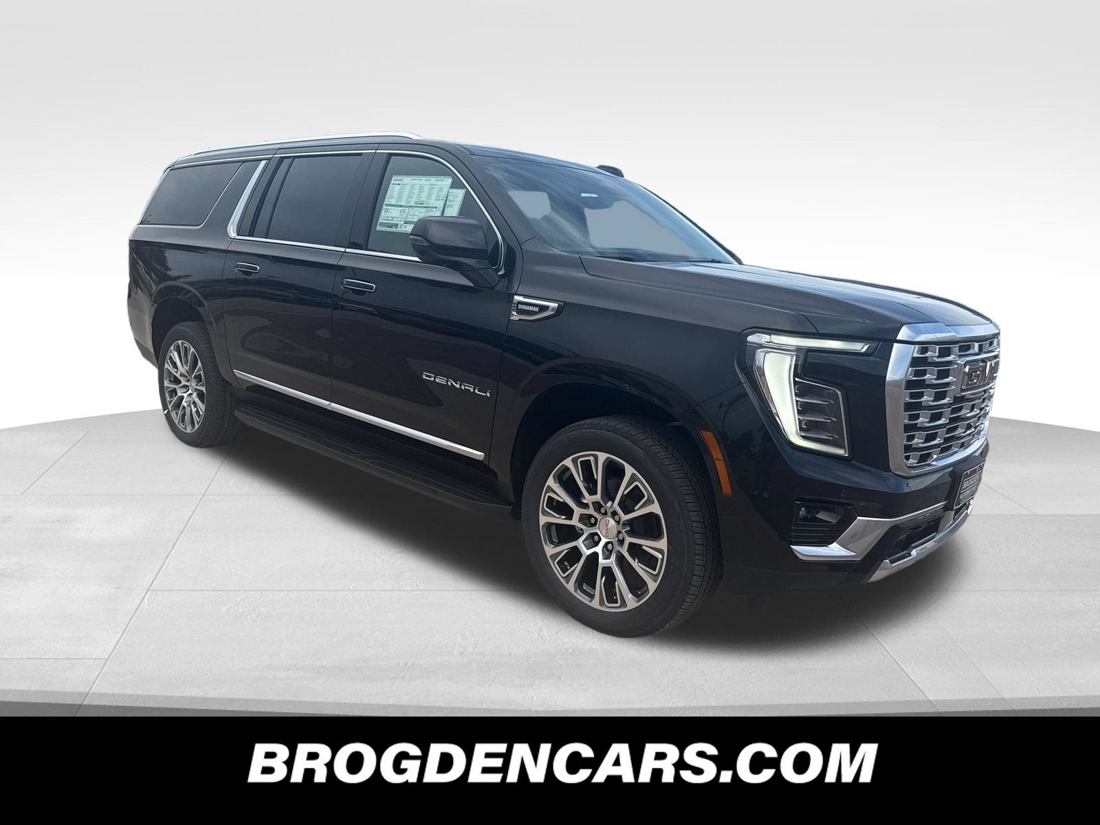 2026 GMC Yukon XL Denali in Onyx Black — front three-quarter view