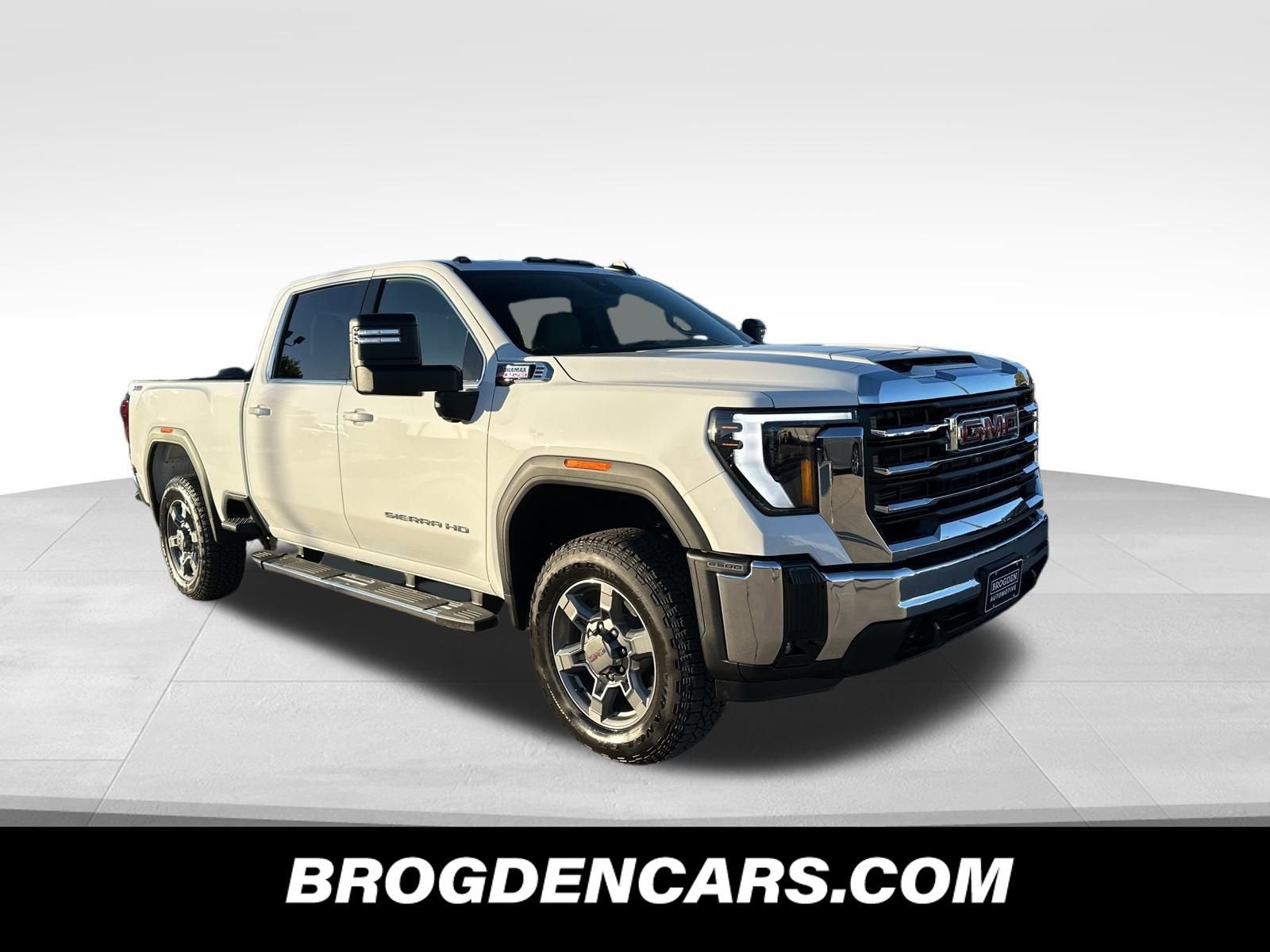 2026 GMC Sierra 2500 HD SLE in Summit White — front three-quarter view