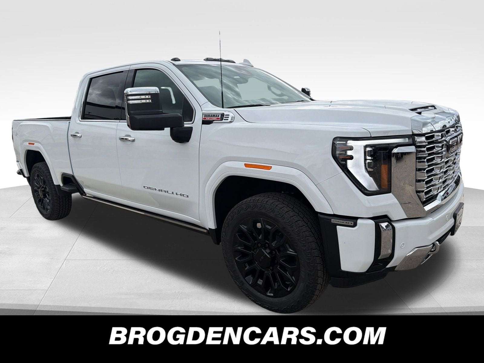 2026 GMC Sierra 2500 HD Denali in Summit White — front three-quarter view