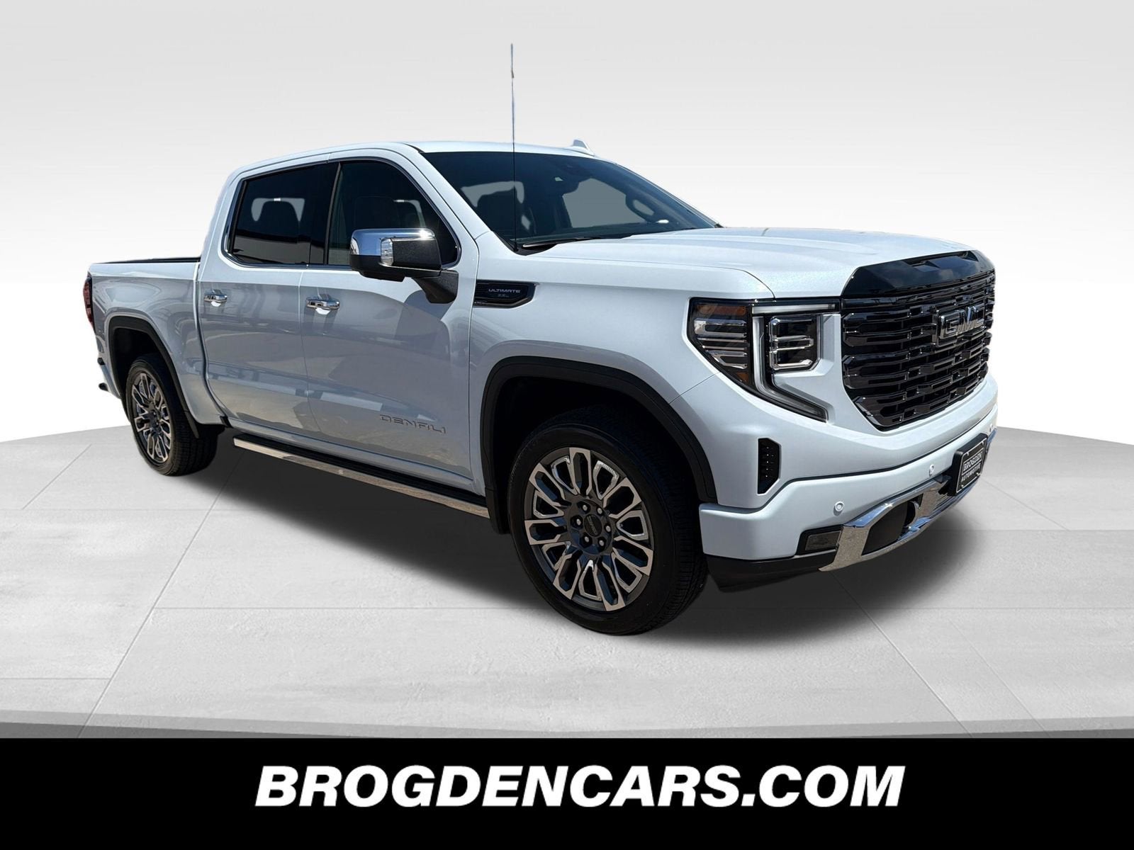 2026 GMC Sierra 1500 Denali Ultimate in Glacier White Tricoat — front three-quarter view