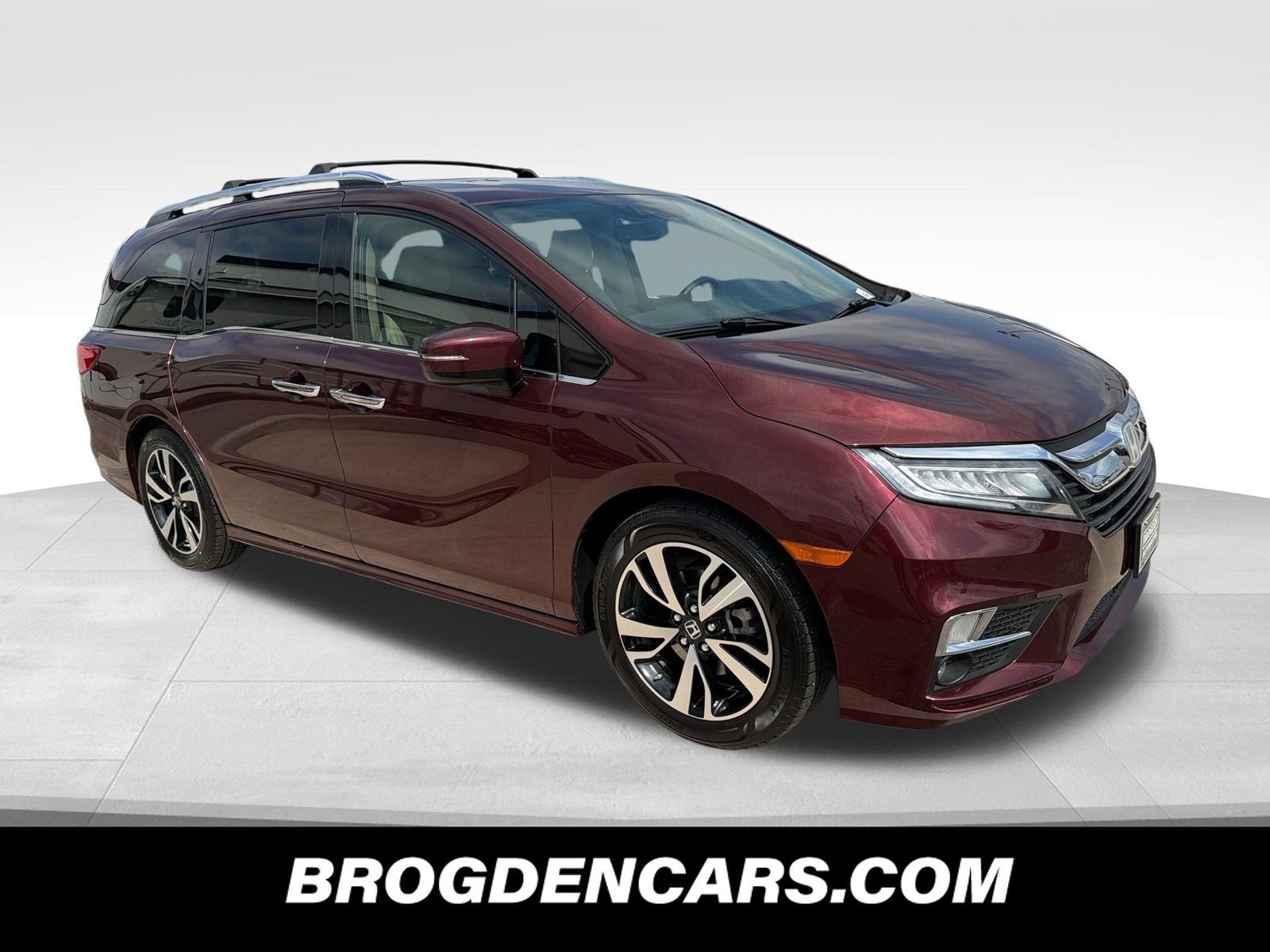 2020 Honda Odyssey Elite in Burgundy — front three-quarter view